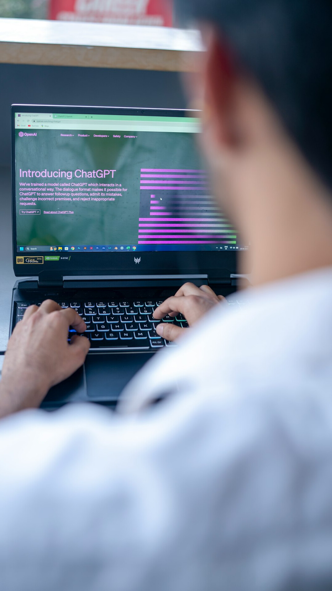 student learning programming on laptop