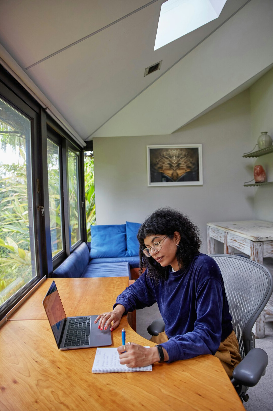 person studying at home desk