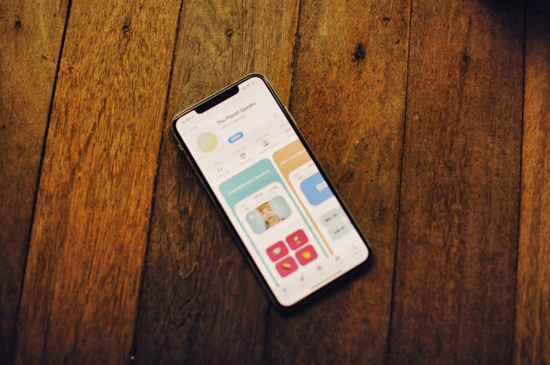 Smartphone displaying a colorful mobile app interface
