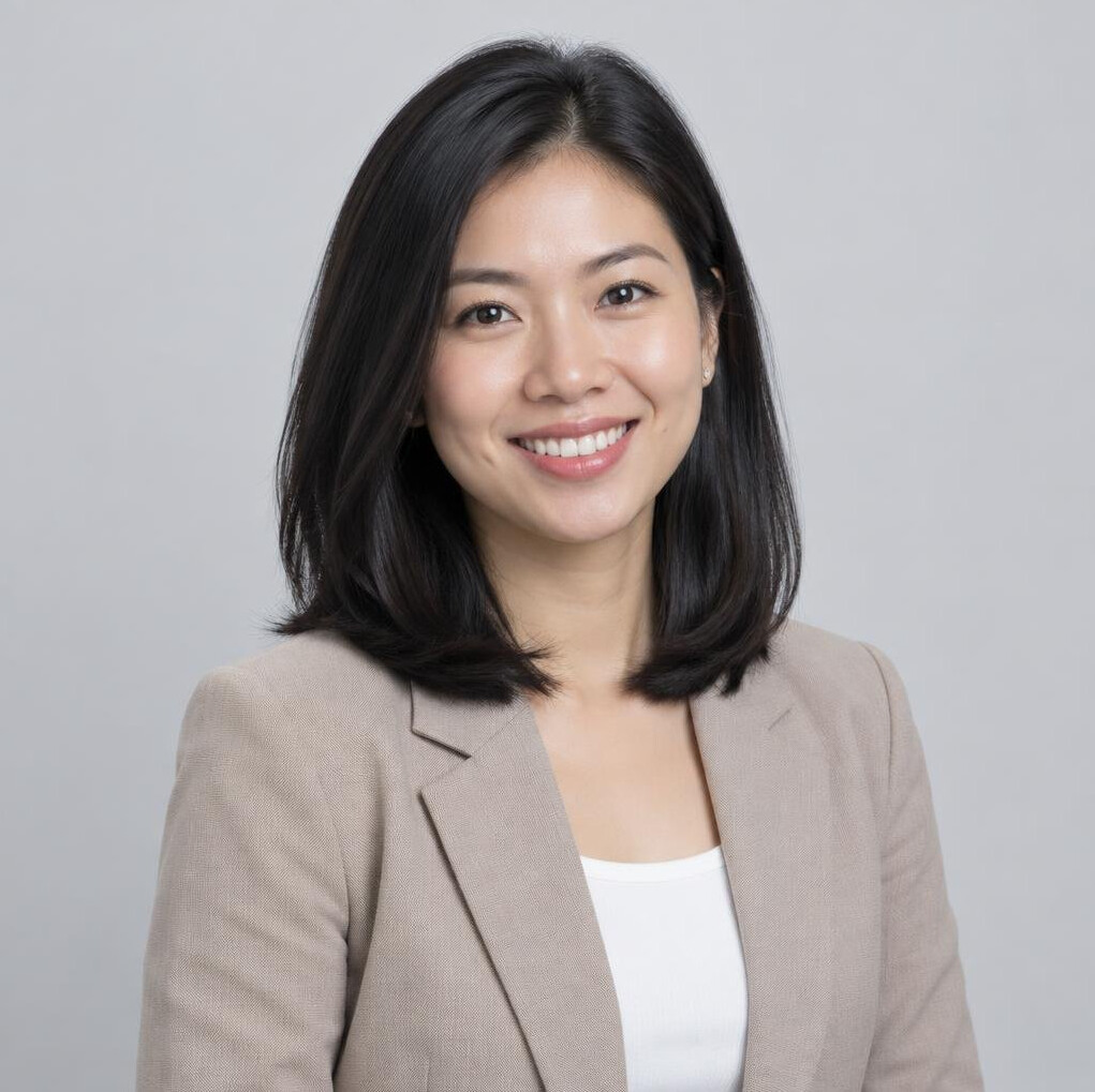 Studio portrait of a young Malaysian Chinese woman smiling