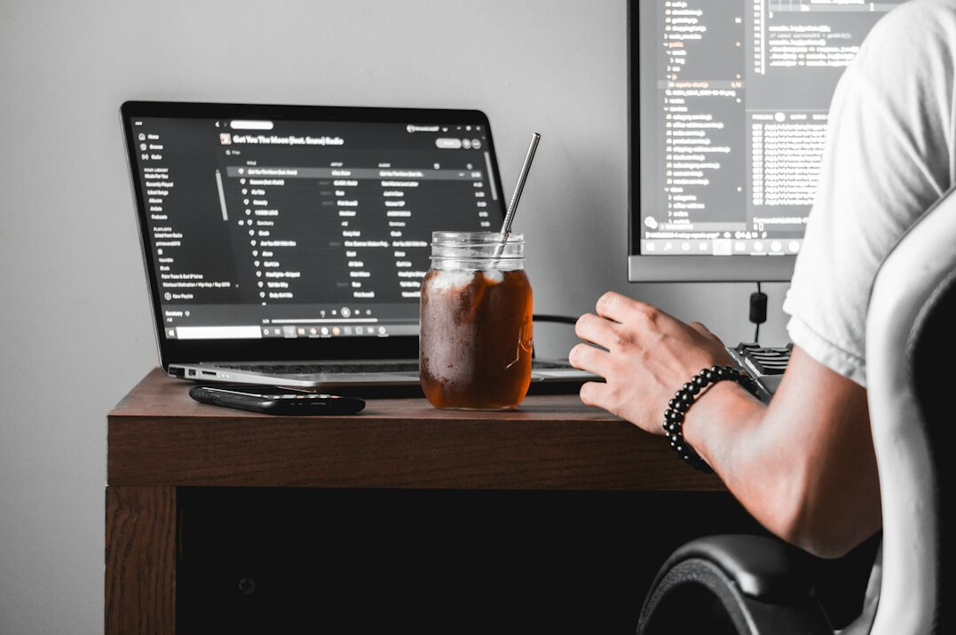 professional developer at desk
