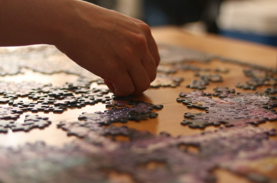 person solving puzzle